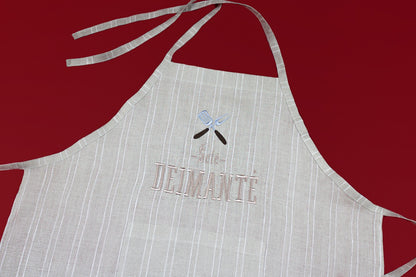 Striped apron in natural linen color