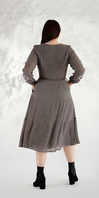 Wool dress with embroidered sleeves